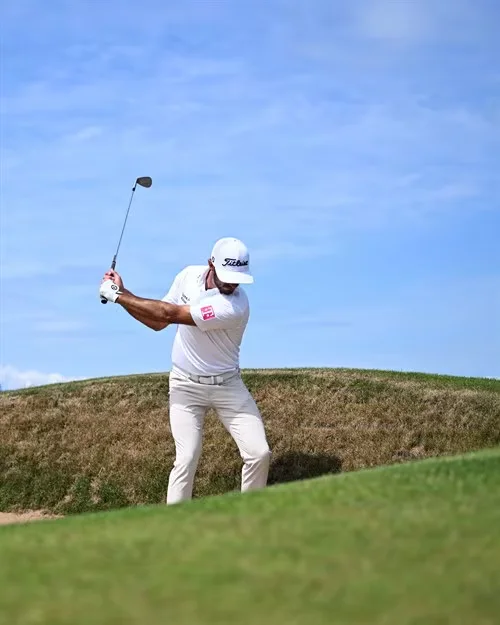 Max Homa takes a swing on tour.